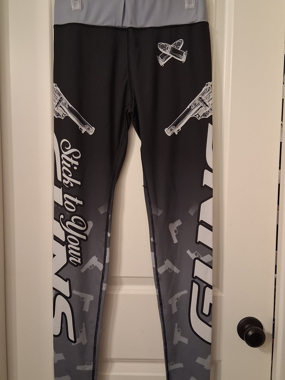 Black & Gray Graphic Leggings with 'Stick to Your Guns' Script